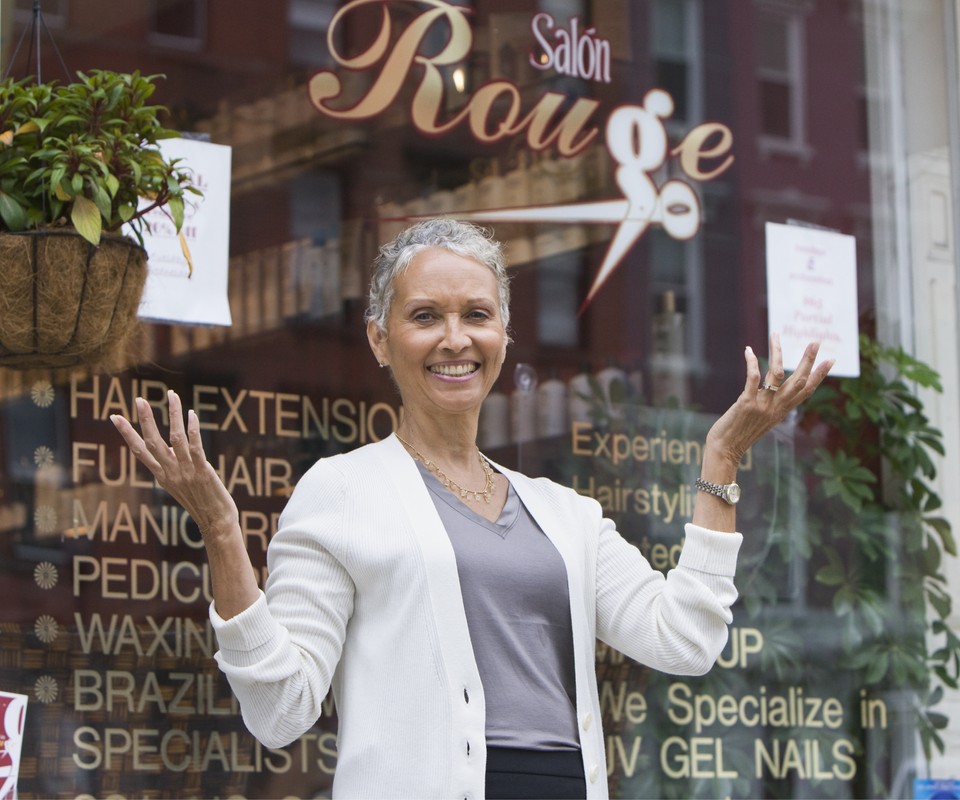 woman business owner celebrating a success