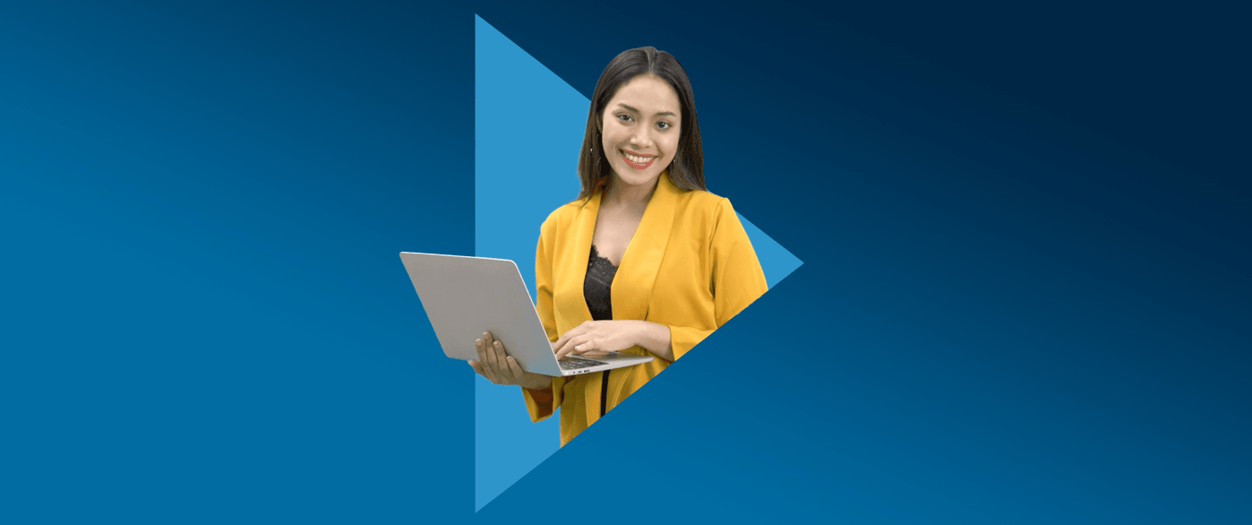 smiling lady holding laptop