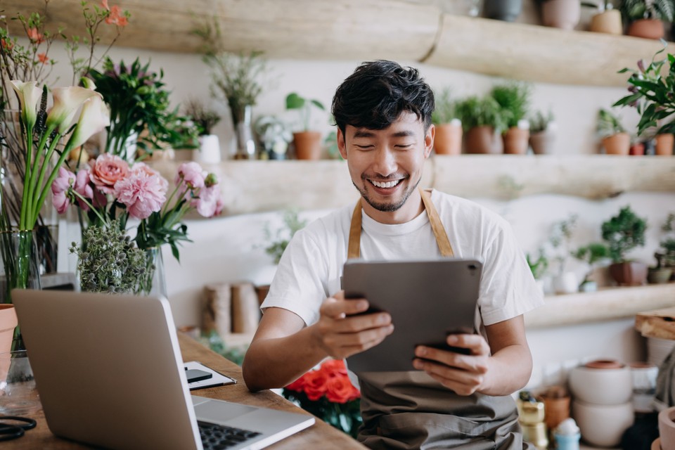 business owner working on tablet
