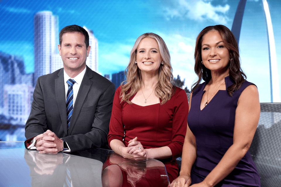 Spectrum News anchors at desk